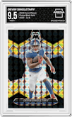 Devin Singletary from the 2024 Panini Mosaic set featuring a Choice Black Gold parallel graded by Arena Club and given an overall grade of 9.5.