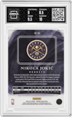 Nikola Jokic from the 2024-25 Panini Origins set featuring a Red parallel graded by Arena Club and given an overall grade of 9.