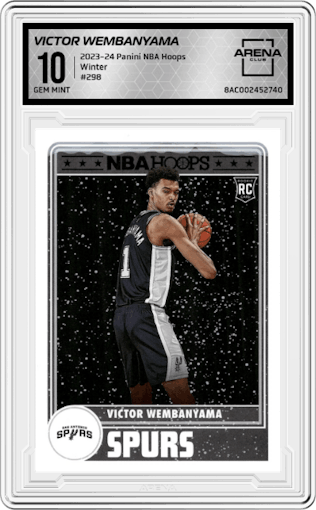 Victor Wembanyama from the 2023-24 Panini NBA Hoops set featuring a Winter parallel graded by Arena Club and given an overall grade of 10.