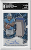 Jahmyr Gibbs from the 2023 Panini Spectra set featuring a Neon Blue parallel graded by Arena Club and given an overall grade of 9.