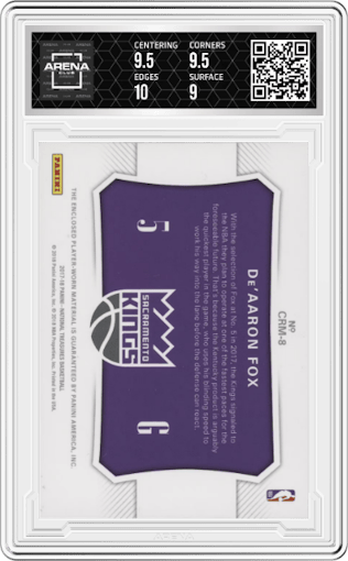 De'Aaron Fox from the 2017-18 Panini National Treasures set featuring a Prime parallel graded by Arena Club and given an overall grade of 9.5.