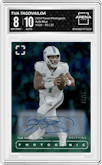 Tua Tagovailoa from the 2024 Panini Photogenic set featuring a Blue parallel graded by Arena Club and given an overall grade of 8.