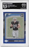Brock Bowers from the 2024 Donruss Optic set featuring a Blue Glitter parallel graded by Arena Club and given an overall grade of 9.5.