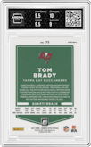 Tom Brady from the 2021 Panini Donruss Optic set featuring a Rocket parallel graded by Arena Club and given an overall grade of 9.5.