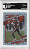 Tom Brady from the 2021 Panini Donruss Optic set featuring a Rocket parallel graded by Arena Club and given an overall grade of 9.5.