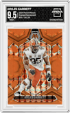 Myles Garrett from the 2024 Panini Mosaic set featuring a Orange Fluorescent parallel graded by Arena Club and given an overall grade of 9.5.