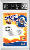 Puka Nacua from the 2024 Donruss set featuring a Gold parallel graded by Arena Club and given an overall grade of 9.5.
