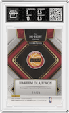 Hakeem Olajuwon  from the 2021-22 Panini Select set featuring a Tie-Dye parallel graded by Arena Club and given an overall grade of 9.