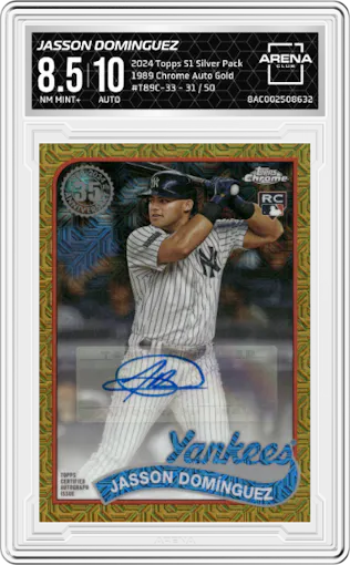Jasson Dominguez from the 2024 Topps Series 1 Silver Pack set featuring a Gold parallel graded by Arena Club and given an overall grade of 8.5.