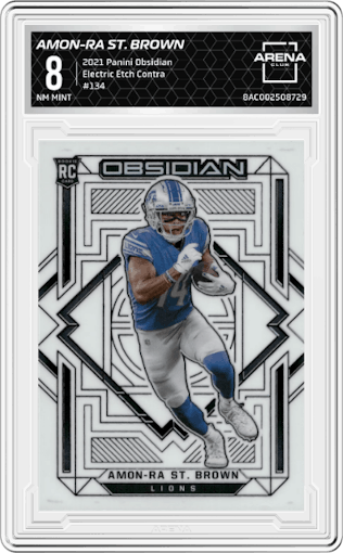 Amon-Ra St. Brown from the 2021 Panini Obsidian set featuring a Electric Etch Contra parallel graded by Arena Club and given an overall grade of 8.