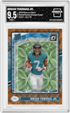 Brian Thomas Jr. from the 2024 Donruss Optic set featuring a Orange Scope parallel graded by Arena Club and given an overall grade of 9.5.