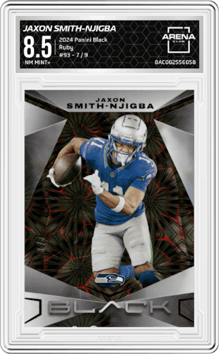 Jaxon Smith-Njigba from the 2024 Panini Black set featuring a Ruby parallel graded by Arena Club and given an overall grade of 8.5.