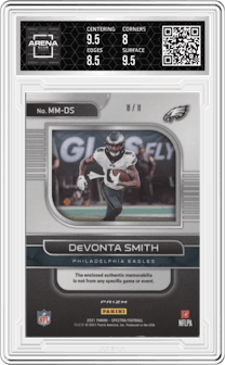 Devonta Smith from the 2021 Panini Spectra set featuring a Neon Splatter parallel graded by Arena Club and given an overall grade of 8.5.