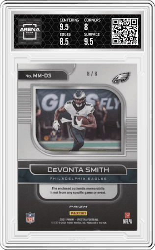 Devonta Smith from the 2021 Panini Spectra set featuring a Neon Splatter parallel graded by Arena Club and given an overall grade of 8.5.