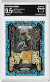 Jayden Reed from the 2023 Panini Prizm set featuring a Blue Sparkle parallel graded by Arena Club and given an overall grade of 9.5.