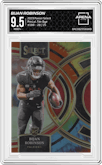 Bijan Robinson from the 2023 Panini Select set featuring a Tie-Dye parallel graded by Arena Club and given an overall grade of 9.5.