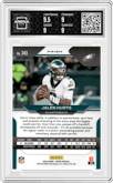 Jalen Hurts from the 2020 Panini Prizm set featuring a Purple Prizm parallel graded by Arena Club and given an overall grade of 9.
