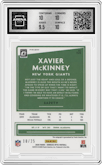 Xavier McKinney from the 2020 Panini Donruss Optic set featuring a Black Pandora parallel graded by Arena Club and given an overall grade of 10.
