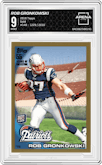 Rob Gronkowski from the 2010 Topps set featuring a Gold parallel graded by Arena Club and given an overall grade of 9.