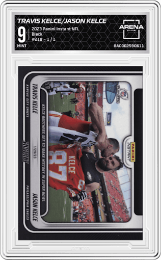 Travis Kelce/Jason Kelce from the 2023 Panini Instant NFL set featuring a Black parallel graded by Arena Club and given an overall grade of 9.