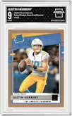 Justin Herbert from the 2020 Panini Donruss set featuring a Press Proof Bronze parallel graded by Arena Club and given an overall grade of 9.