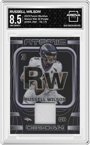 Russell Wilson from the 2023 Panini Obsidian set featuring a Electric Etch Purple parallel graded by Arena Club and given an overall grade of 8.5.