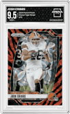 Josh Cribbs from the 2024 Panini Prizm set featuring a Choice Tiger Stripe Prizm parallel graded by Arena Club and given an overall grade of 9.5.