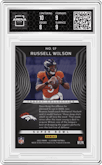 Russell Wilson  from the 2022 Panini Illusions set featuring a Trophy Collection Purple parallel graded by Arena Club and given an overall grade of 8.5.