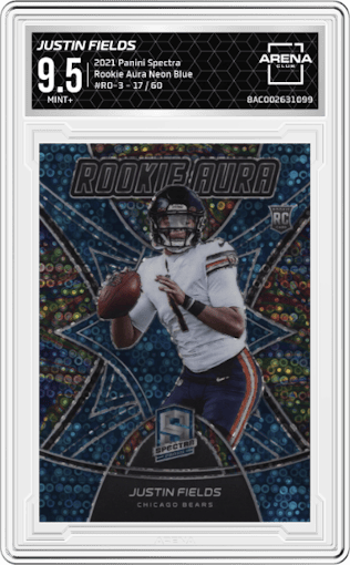 Justin Fields from the 2021 Panini Spectra set featuring a Neon Blue parallel graded by Arena Club and given an overall grade of 9.5.