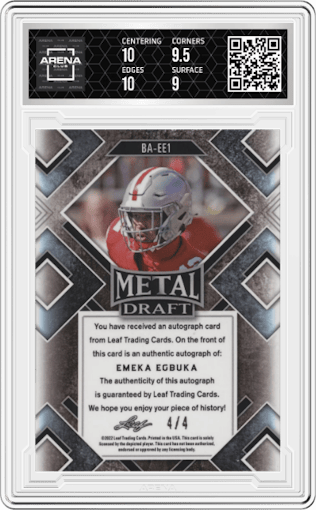 Emeka Egbuka from the 2022 Leaf Metal Draft set featuring a Green Mojo parallel graded by Arena Club and given an overall grade of 9.5.