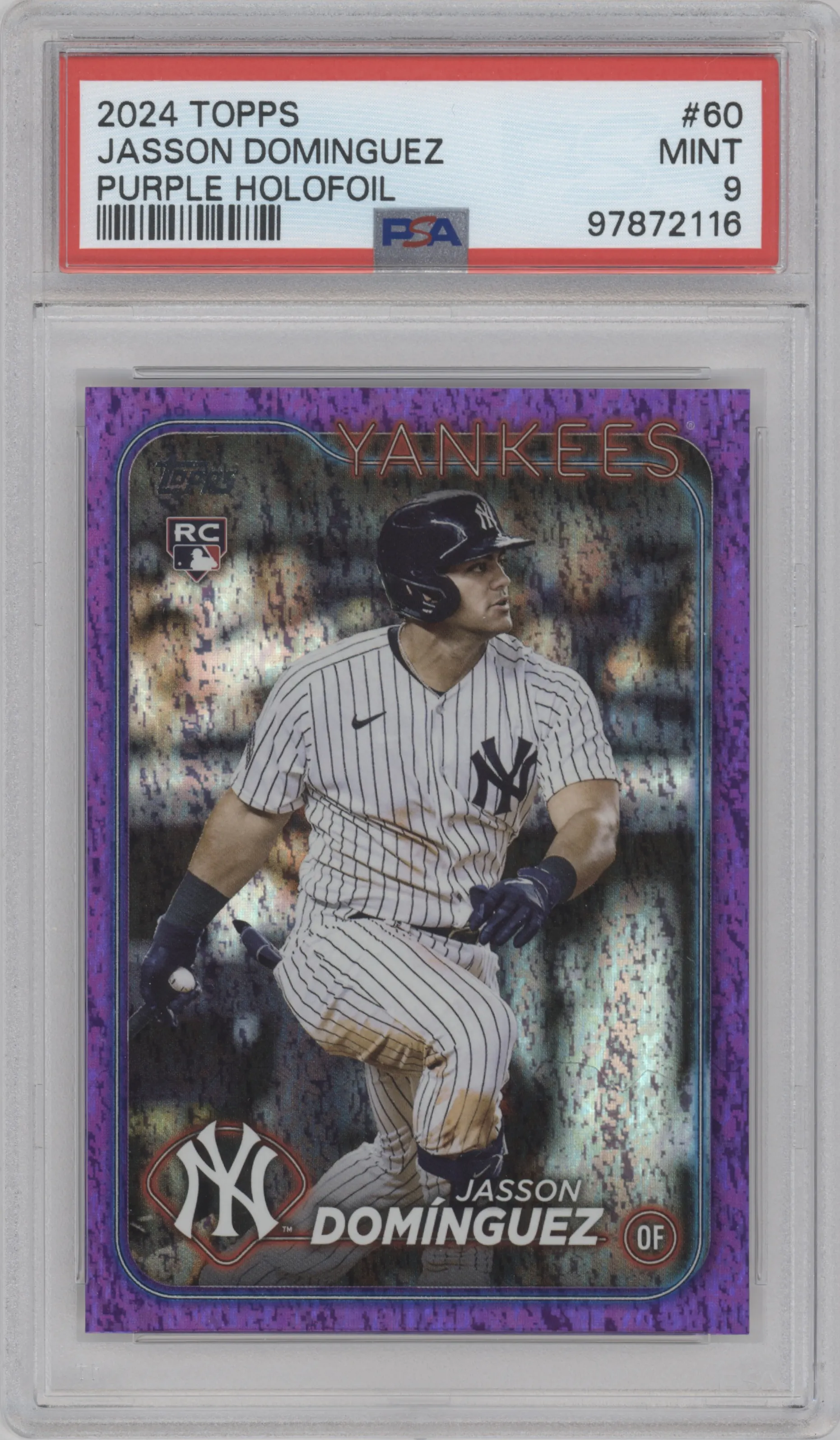Jasson Dominguez from the 2024 Topps  set featuring a Purple Holofoil parallel graded by PSA and given an overall grade of 9.