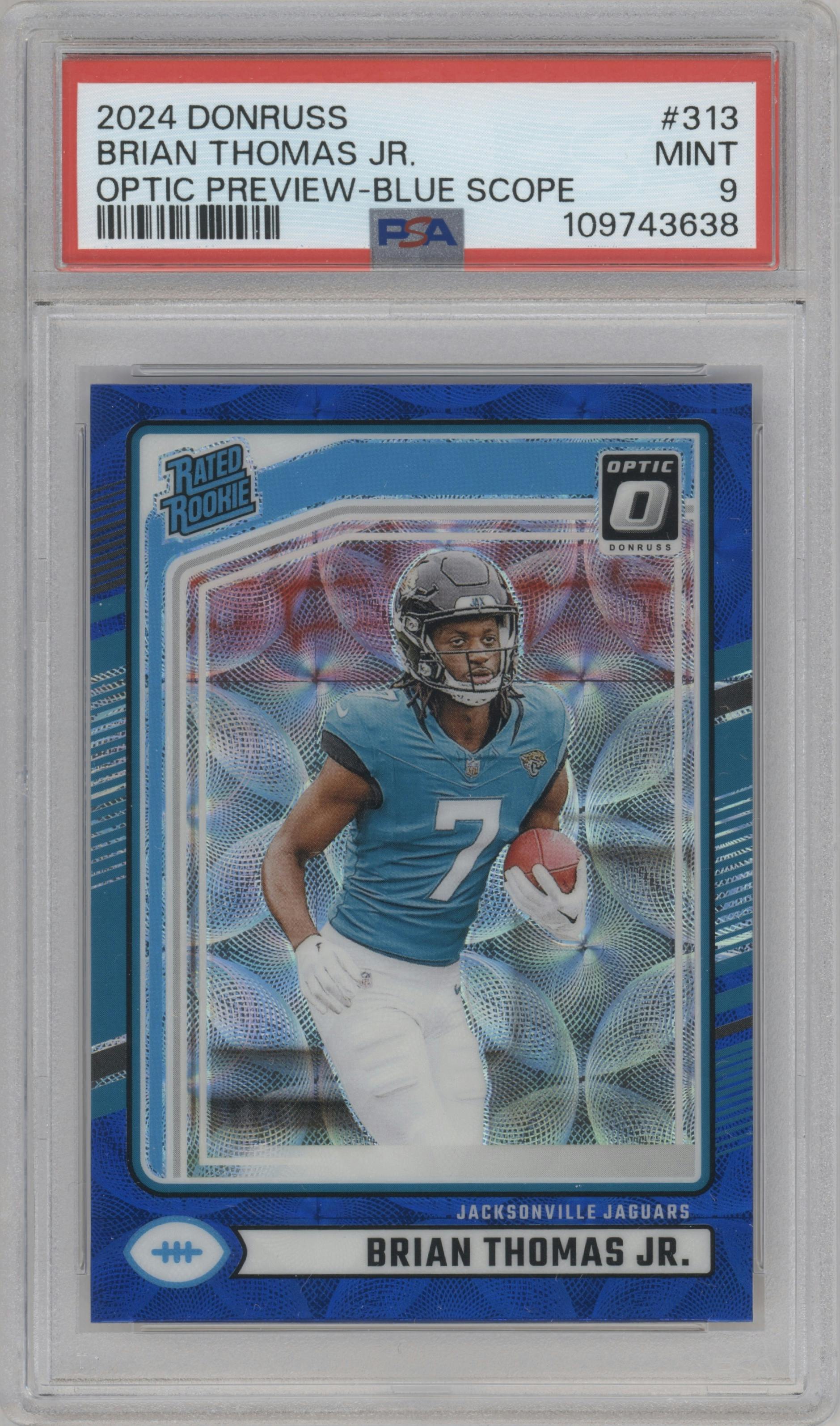 Brian Thomas Jr. from the 2024 Donruss set featuring a Blue Scope parallel graded by PSA and given an overall grade of 9.