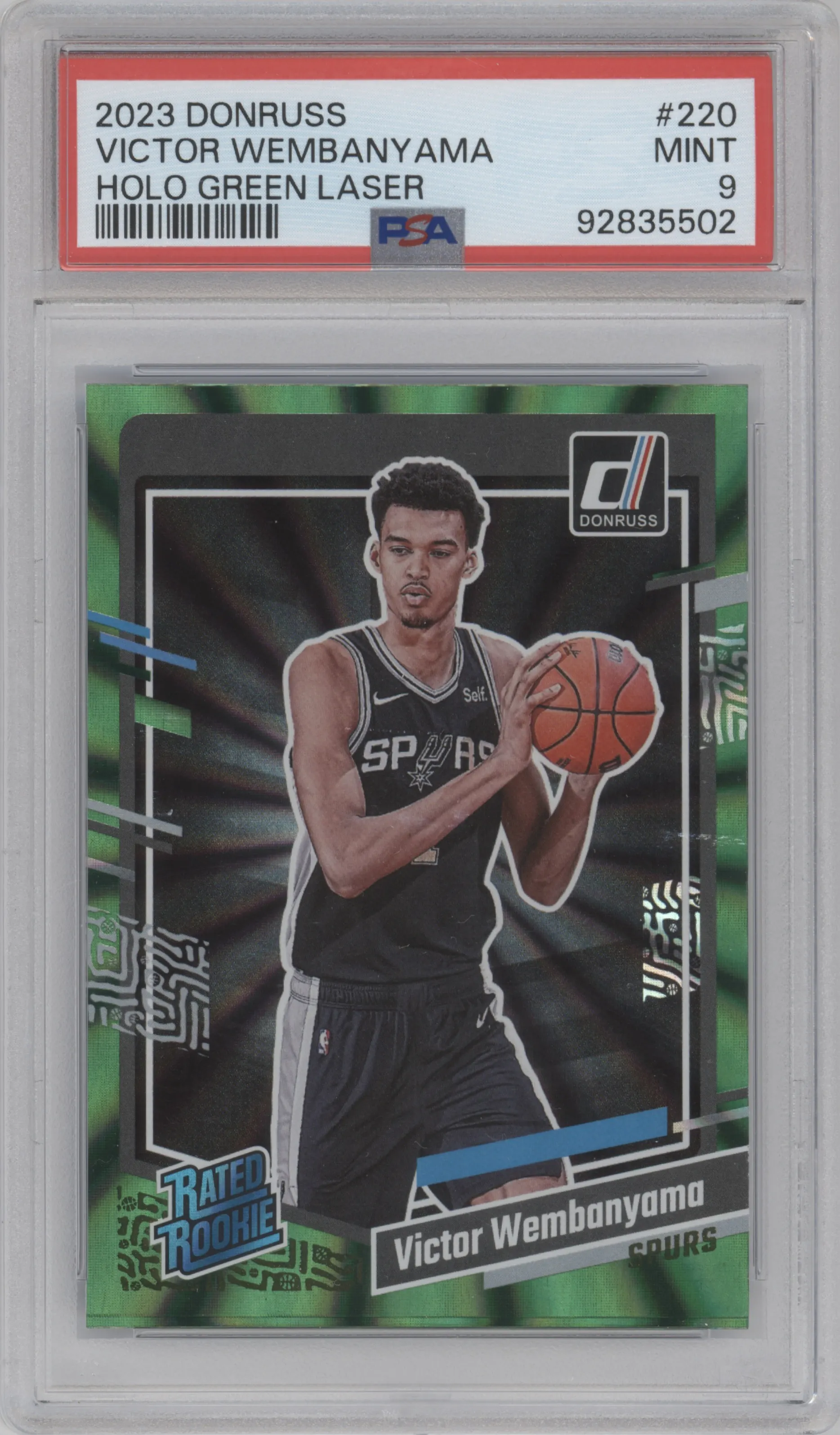 Victor Wembanyama from the 2023-24 Panini Donruss set featuring a Green Holo Laser  parallel graded by PSA and given an overall grade of 9.