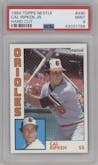Cal Ripken from the 1984 Topps Nestle set featuring a Hand Cut parallel graded by PSA and given an overall grade of 9.