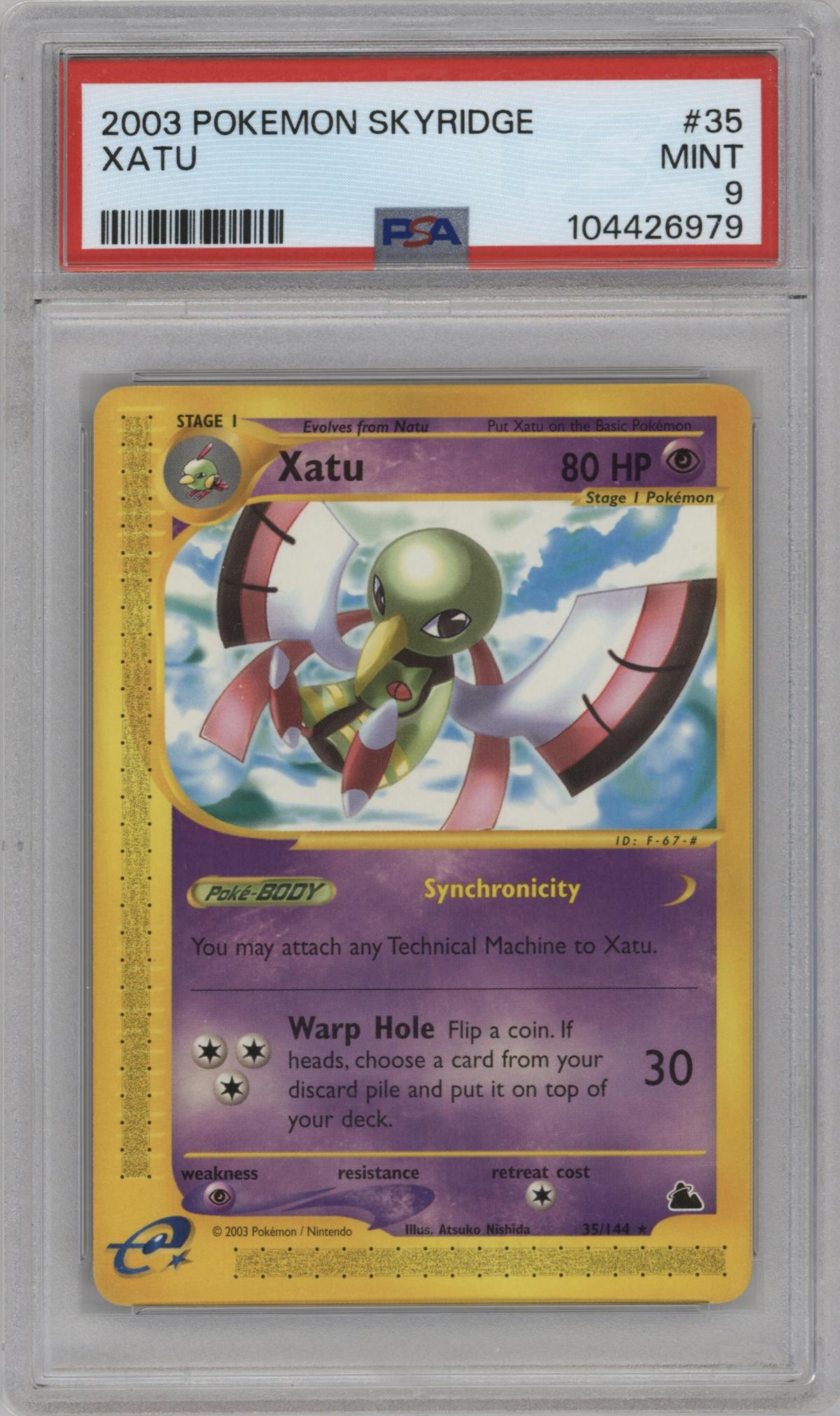 Xatu from the 2003 Pokemon E-CARD set graded by PSA and given an overall grade of 9.