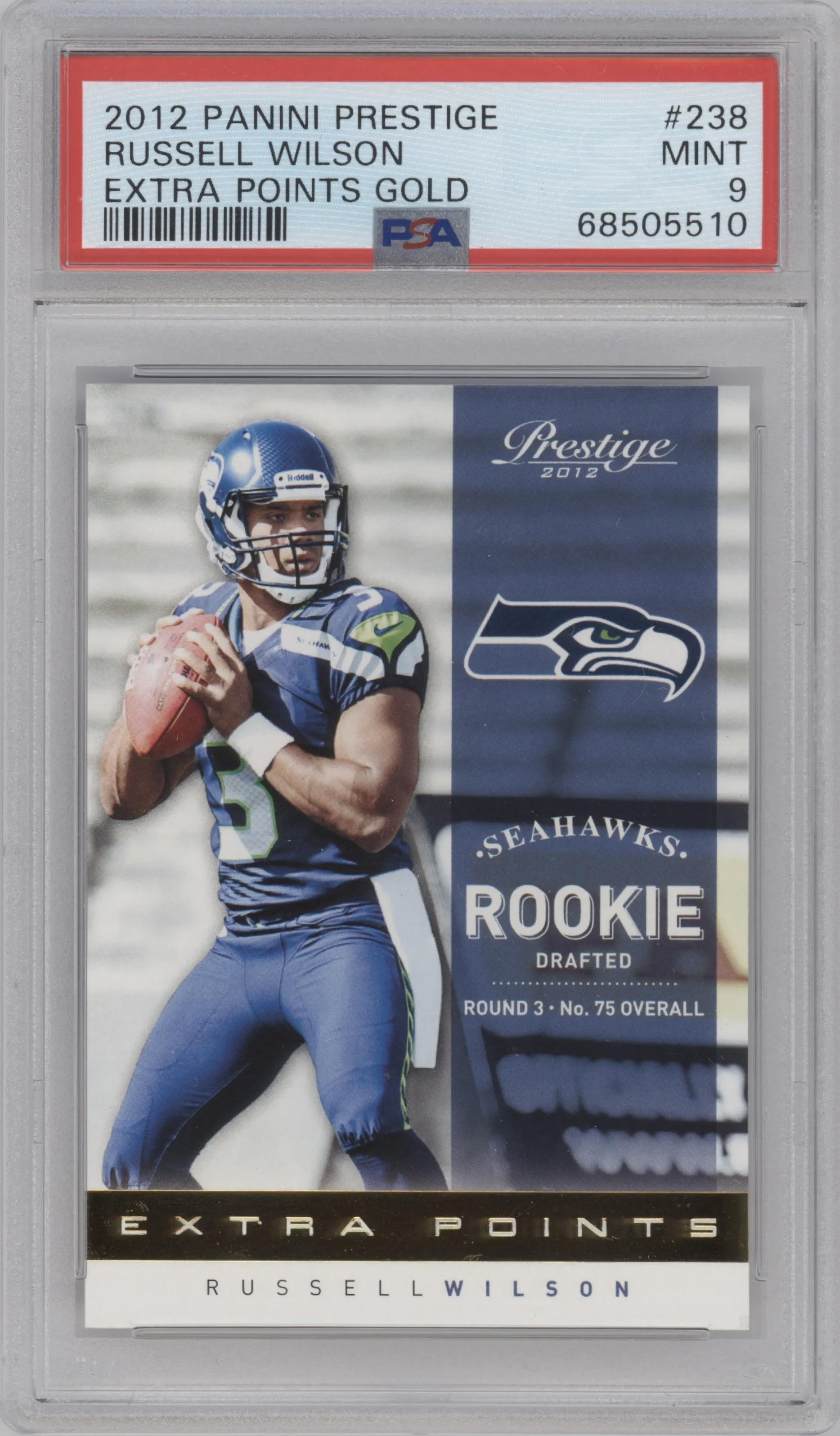 Russell Wilson from the 2012 Panini Prestige set featuring a Extra Points Gold parallel graded by PSA and given an overall grade of 9.
