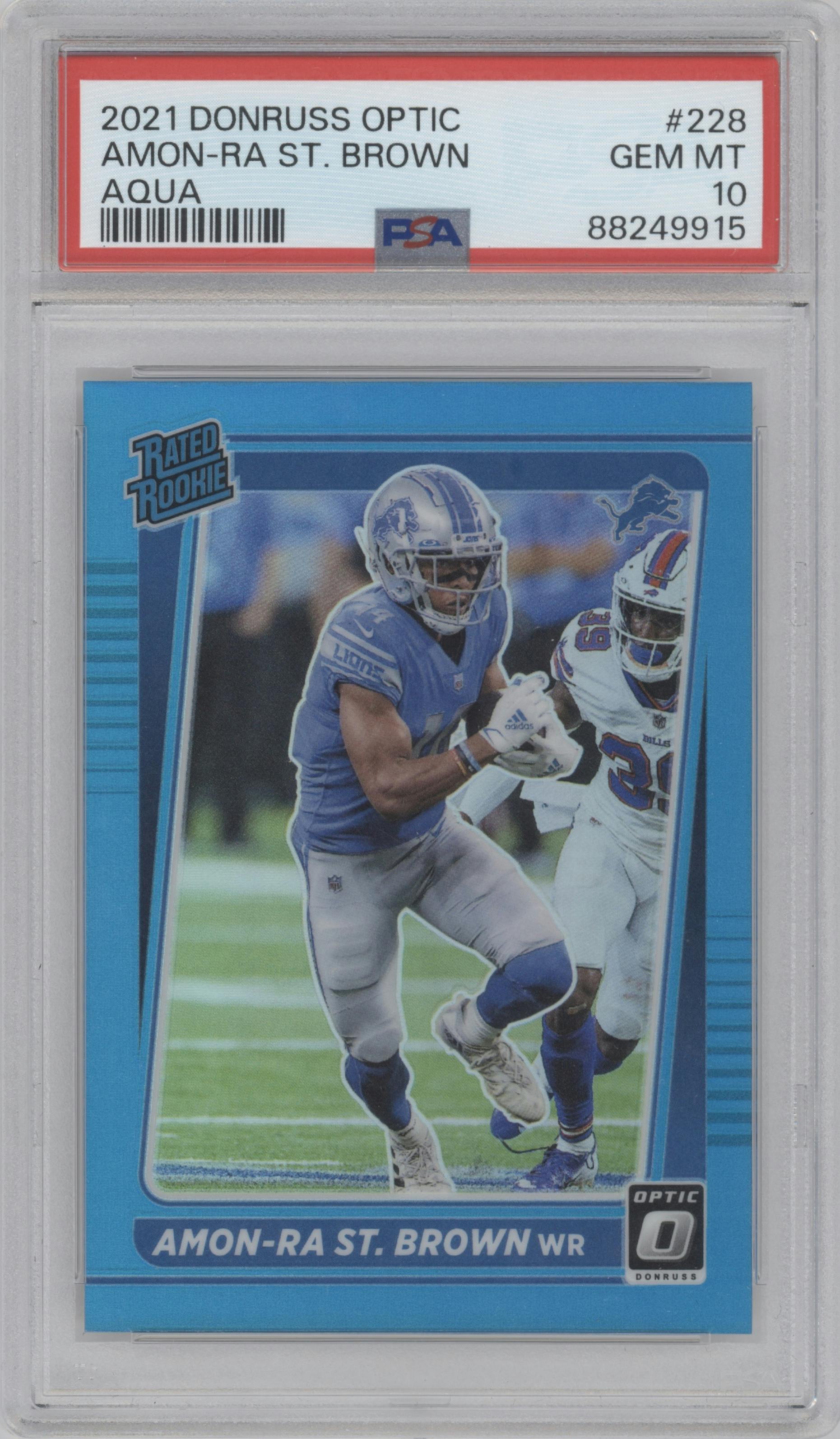 Amon-Ra St. Brown from the 2021 Panini Donruss Optic set featuring a Aqua parallel graded by PSA and given an overall grade of 10.