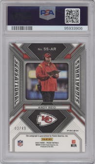 Andy Reid from the 2023 Panini Prizm set featuring a Purple Power Prizm parallel graded by PSA and given an overall grade of 10.