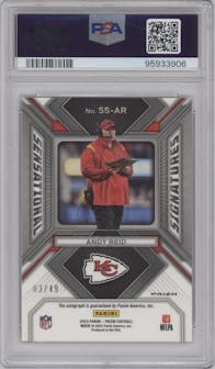 Andy Reid from the 2023 Panini Prizm set featuring a Purple Power Prizm parallel graded by PSA and given an overall grade of 10.