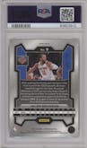 Jalen Brunson from the 2023-24 Panini Prizm set featuring a White Prizm parallel graded by PSA and given an overall grade of 9.