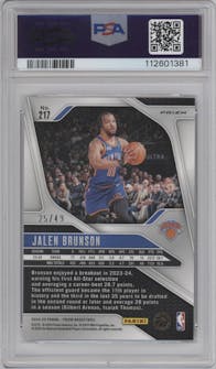 Jalen Brunson from the 2024-25 Panini Prizm set featuring a Choice Blue parallel graded by PSA and given an overall grade of 10.