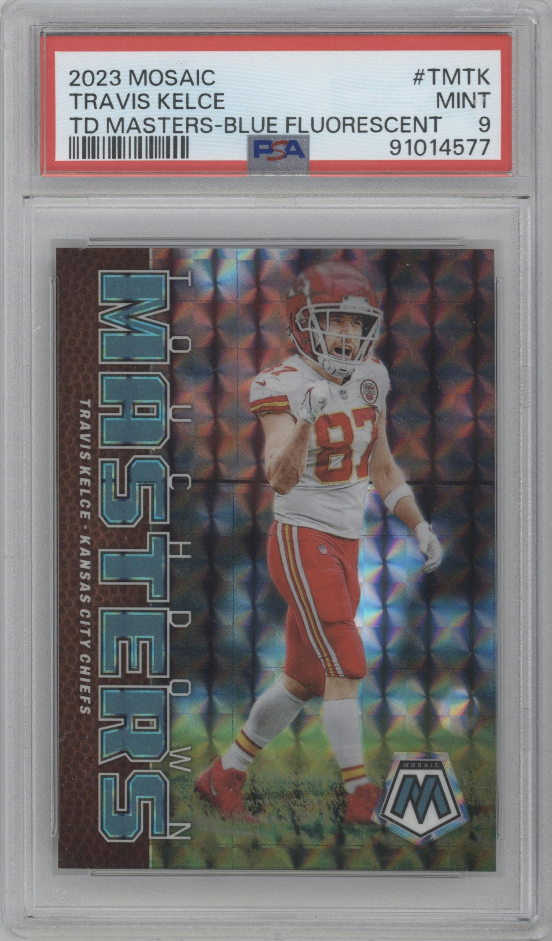 Travis Kelce from the 2023 Panini Mosaic set featuring a Blue Fluorescent parallel graded by PSA and given an overall grade of 9.