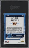 Jayden Daniels from the 2024 Donruss set featuring a Red and Green parallel graded by SGC and given an overall grade of 9.5.
