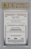 Mike Trout from the 2023 Topps Definitive Collection set featuring a Green parallel graded by Beckett and given an overall grade of 9.5.