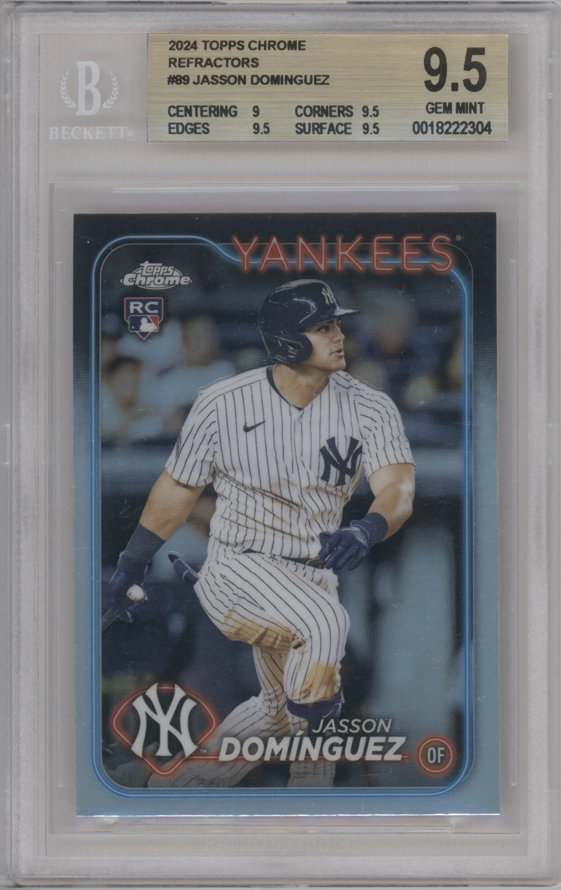 Jasson Dominguez from the 2024 Topps Chrome set featuring a Refractor parallel graded by Beckett and given an overall grade of 9.5.