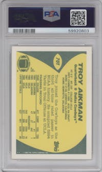 Troy Aikman from the 1989 Topps Traded set graded by PSA and given an overall grade of 7.