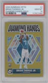 Brian Thomas Jr. from the 2024 Donruss Optic set featuring a Gold parallel graded by PSA and given an overall grade of 10.
