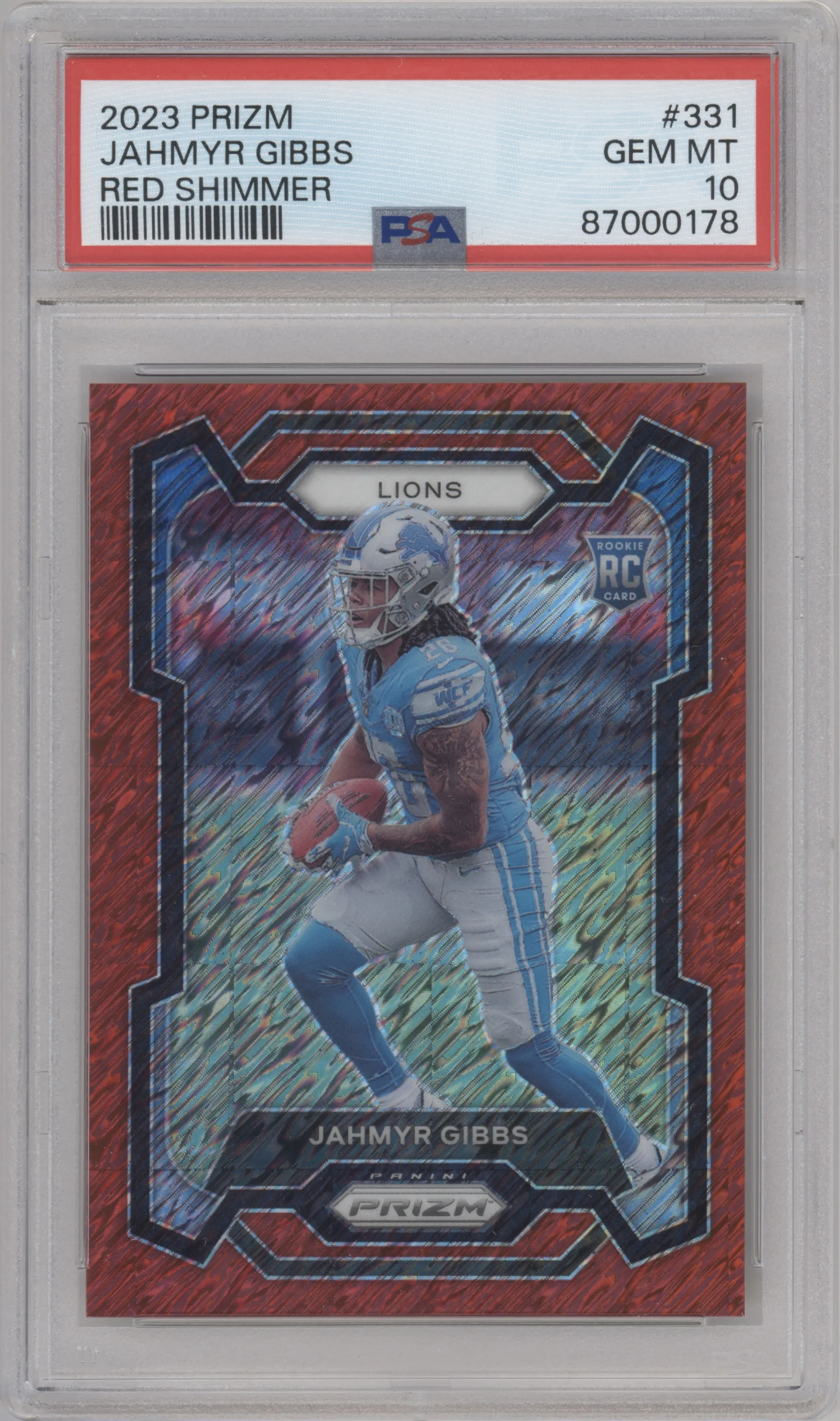 Jahmyr Gibbs from the 2023 Panini Prizm set featuring a Red Shimmer parallel graded by PSA and given an overall grade of 10.