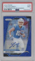 Ladd McConkey from the 2024 Panini Prizm set featuring a Blue Shimmer parallel graded by PSA and given an overall grade of 9.