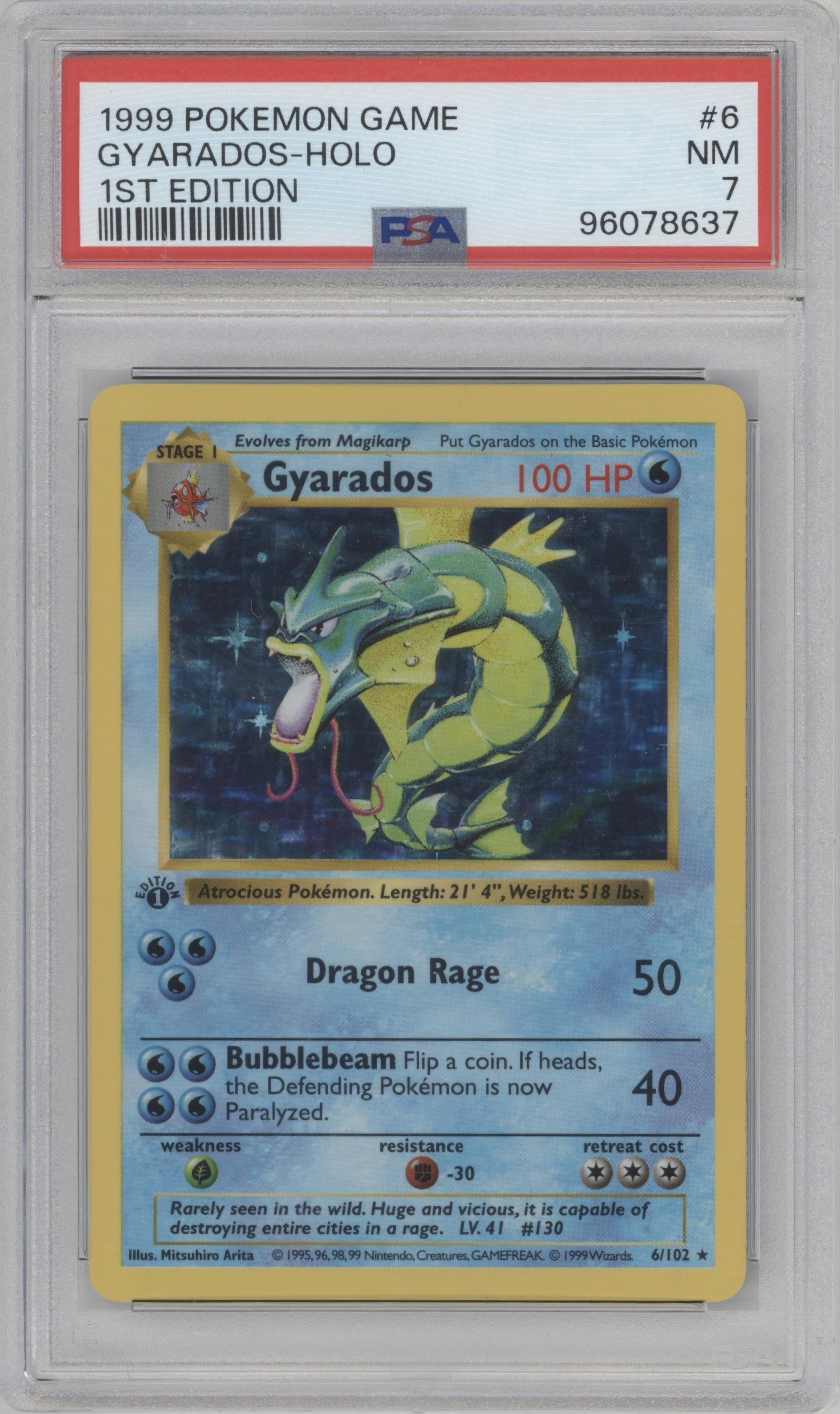 Gyarados from the 1999 Pokemon set graded by PSA and given an overall grade of 7.